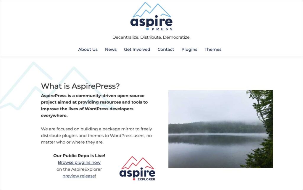Website screenshot for AspirePress, featuring a lake and foggy landscape.